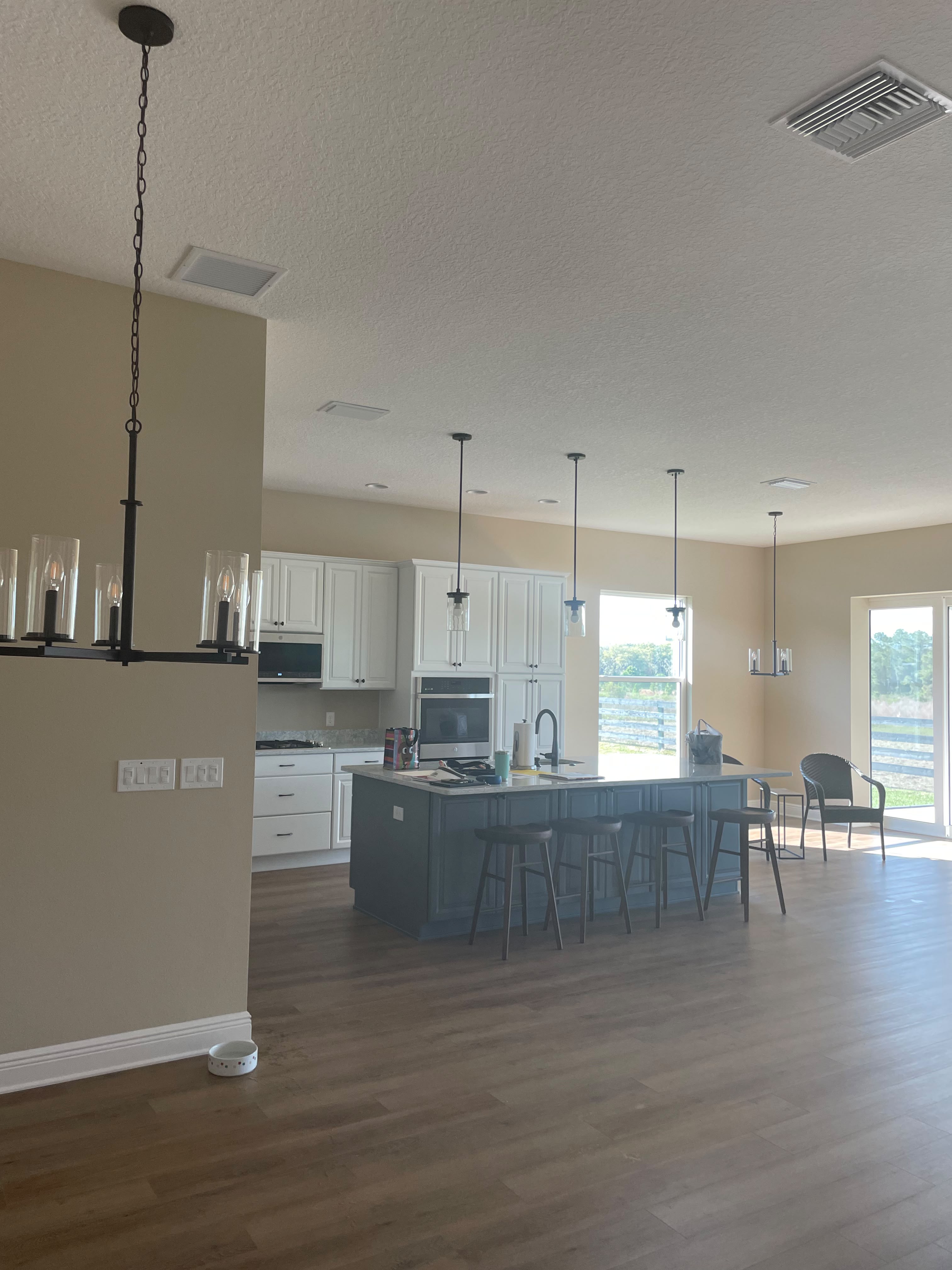 Kitchen cabinet painting by Chris Quality Painting